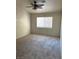 This bedroom features a ceiling fan and a window that provides natural light at 2110 Los Feliz St # 2037, Las Vegas, NV 89156