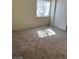 This bedroom offers a window and a closet with sliding doors for plenty of storage at 2110 Los Feliz St # 2037, Las Vegas, NV 89156
