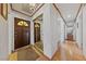 Welcoming entryway boasting wood floors, with a decorative front door and interior hallway at 22 Jade Cir, Las Vegas, NV 89106