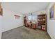 Functional office space with a built-in desk, shelving, and natural light at 22 Jade Cir, Las Vegas, NV 89106