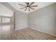 Bedroom featuring a modern ceiling fan and wood-look floors at 2603 Savannah Springs Ave, Henderson, NV 89052
