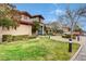 A well maintained building with beautiful landscaping and a sidewalk at 2603 Savannah Springs Ave, Henderson, NV 89052