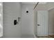 Shower features modern fixtures, light-colored textured walls, and a glass door at 2603 Savannah Springs Ave, Henderson, NV 89052