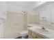Clean bathroom with tiled shower/tub, toilet, vanity, and a large mirror at 270 Snowy River Cir, Henderson, NV 89074