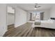 Spacious bedroom featuring wood floors, and a large window with a built-in bench at 270 Snowy River Cir, Henderson, NV 89074