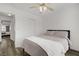 Comfortable bedroom offers ceiling fan, wood floors and natural light at 270 Snowy River Cir, Henderson, NV 89074