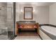 Modern bathroom features dual vanity, shower, and soaking tub at 2700 Las Vegas Blvd # 610, Las Vegas, NV 89109