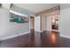 Spacious bedroom with hardwood floors, tv, and ample lighting at 2700 Las Vegas Blvd # 610, Las Vegas, NV 89109