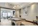 Beautiful game room with a pool table, modern lighting, and sitting area at 2700 Las Vegas Blvd # 610, Las Vegas, NV 89109