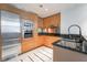 Well-lit kitchen features stainless steel appliances, stylish cabinets and beautiful marble countertops at 2700 Las Vegas Blvd # 610, Las Vegas, NV 89109