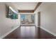 Well-lit living room with hardwood floors and a large sliding glass door overlooking the city at 2700 Las Vegas Blvd # 610, Las Vegas, NV 89109