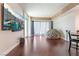 Living room with hardwood floors and access to balcony with city view at 2700 Las Vegas Blvd # 610, Las Vegas, NV 89109
