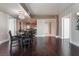Elegant living and dining area features hardwood floors, city views, and modern stainless appliances at 2700 Las Vegas Blvd # 610, Las Vegas, NV 89109