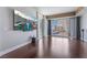Bright living room with hardwood floors, floor to ceiling windows, and city view at 2700 Las Vegas Blvd # 610, Las Vegas, NV 89109