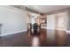 Open-concept living and dining room with hardwood floors and direct access to kitchen area at 2700 Las Vegas Blvd # 610, Las Vegas, NV 89109