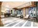Elegant lobby area with fireplace, modern seating, and stylish decor with a view of the city at 2700 Las Vegas Blvd # 610, Las Vegas, NV 89109