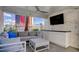 Stylish outdoor lounge area with comfortable seating, marble walls and a flat screen TV at 2700 Las Vegas Blvd # 610, Las Vegas, NV 89109