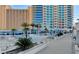 Stunning pool area with sleek design, palm trees, lounge chairs and modern architecture at 2700 Las Vegas Blvd # 610, Las Vegas, NV 89109
