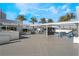 A beautiful pool area featuring outdoor seating and a grilling area at a luxury building with palm trees at 2700 Las Vegas Blvd # 610, Las Vegas, NV 89109
