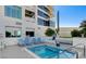 A beautiful inground pool at a luxury building, featuring a lift for accessibility and seating area with lounge chairs at 2700 Las Vegas Blvd # 610, Las Vegas, NV 89109