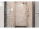 Modern shower stall with light marble tiles and modern shower head at 2700 Las Vegas Blvd # 610, Las Vegas, NV 89109