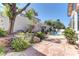 Beautiful backyard with a patio, pool, and lush landscaping at 2725 Cool Lilac Ave, Henderson, NV 89052