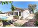 Exterior view of home and back yard with pool, spa and covered patio at 2725 Cool Lilac Ave, Henderson, NV 89052