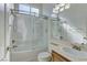Bathroom featuring tub and shower, sink and counter with modern fixtures at 2725 Cool Lilac Ave, Henderson, NV 89052