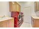 Convenient laundry room with modern, front-loading washer and dryer at 2725 Cool Lilac Ave, Henderson, NV 89052