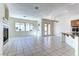 Large open living room combines the kitchen with breakfast nook and a fireplace, creating a great space at 2725 Cool Lilac Ave, Henderson, NV 89052