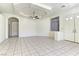 Spacious living room with tile flooring, ceiling fan, and recessed lighting at 2725 Cool Lilac Ave, Henderson, NV 89052