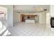 Large living room combines kitchen, breakfast nook, fireplace, and natural light, a great home for entertaining at 2725 Cool Lilac Ave, Henderson, NV 89052