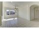 Large living area with tile flooring, generous natural light, ceiling fan and an open floor plan at 2725 Cool Lilac Ave, Henderson, NV 89052