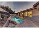 Tranquil pool area with stone accents, steps, and ample space for lounging and outdoor enjoyment at 2725 Cool Lilac Ave, Henderson, NV 89052