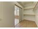 Walk-in closet with ample storage space and access to the bathroom at 2725 Cool Lilac Ave, Henderson, NV 89052