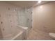A modern bath and shower featuring striking vertical tile accents at 29 Montelago Blvd # 336, Henderson, NV 89011