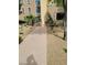 Condo building entrance with a walking path and small trees at 29 Montelago Blvd # 336, Henderson, NV 89011