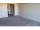 Bright living area with neutral carpet and walls, and multiple doors adding to the open feeling at 29 Montelago Blvd # 336, Henderson, NV 89011