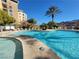 Beautiful pool and spa with palm trees and mountain views at 29 Montelago Blvd # 336, Henderson, NV 89011