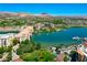 Beautiful aerial view of the waterfront community highlighting the lake, bridge, and lush green landscaping at 29 Montelago Blvd # 520, Henderson, NV 89011