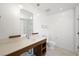 Contemporary bathroom with an extended vanity, modern fixtures, and a glass enclosed shower with white subway tile at 29 Montelago Blvd # 520, Henderson, NV 89011