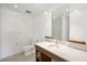 Bathroom with contemporary fixtures, a white countertop, and a toilet, all illuminated by modern lighting at 29 Montelago Blvd # 520, Henderson, NV 89011