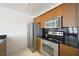 Kitchen features stainless steel appliances and modern cabinetry at 29 Montelago Blvd # 520, Henderson, NV 89011