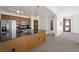 Modern kitchen with stainless steel appliances and black countertops, integrated into open living space at 29 Montelago Blvd # 520, Henderson, NV 89011