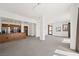 Bright, open-concept living space featuring a kitchen bar, dining area, and cozy living room bathed in natural light at 29 Montelago Blvd # 520, Henderson, NV 89011