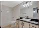 Bathroom features tile floors, neutral paint, double sink vanity and tub with shower at 2900 Sunridge Heights Pkwy # 518, Henderson, NV 89052