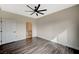 Bright bedroom with ceiling fan and view into ensuite bathroom at 2900 Sunridge Heights Pkwy # 518, Henderson, NV 89052