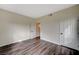 Bedroom features wood-look floors, neutral paint, baseboards, two closets and a window at 2900 Sunridge Heights Pkwy # 518, Henderson, NV 89052