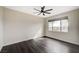Bright bedroom with large window, ceiling fan and attractive wood flooring at 2900 Sunridge Heights Pkwy # 518, Henderson, NV 89052