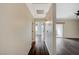 Bright hallway features wood floors, neutral paint and provides access to various rooms in the home at 2900 Sunridge Heights Pkwy # 518, Henderson, NV 89052